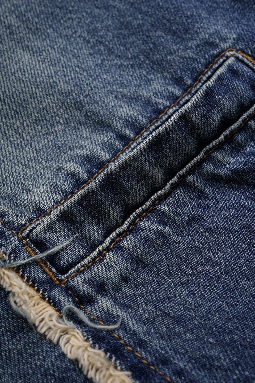 Denim Fringe Asymmetrical Pocket Horseshoe Jeans