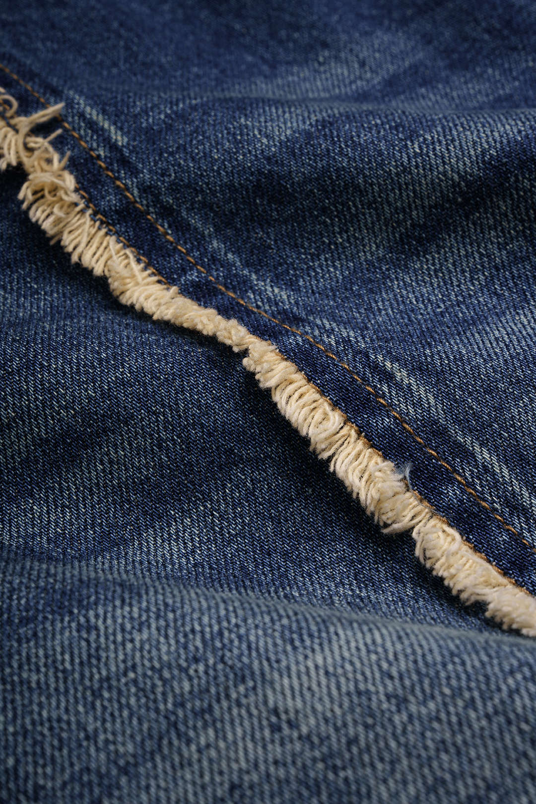 Denim Fringe Asymmetrical Pocket Horseshoe Jeans